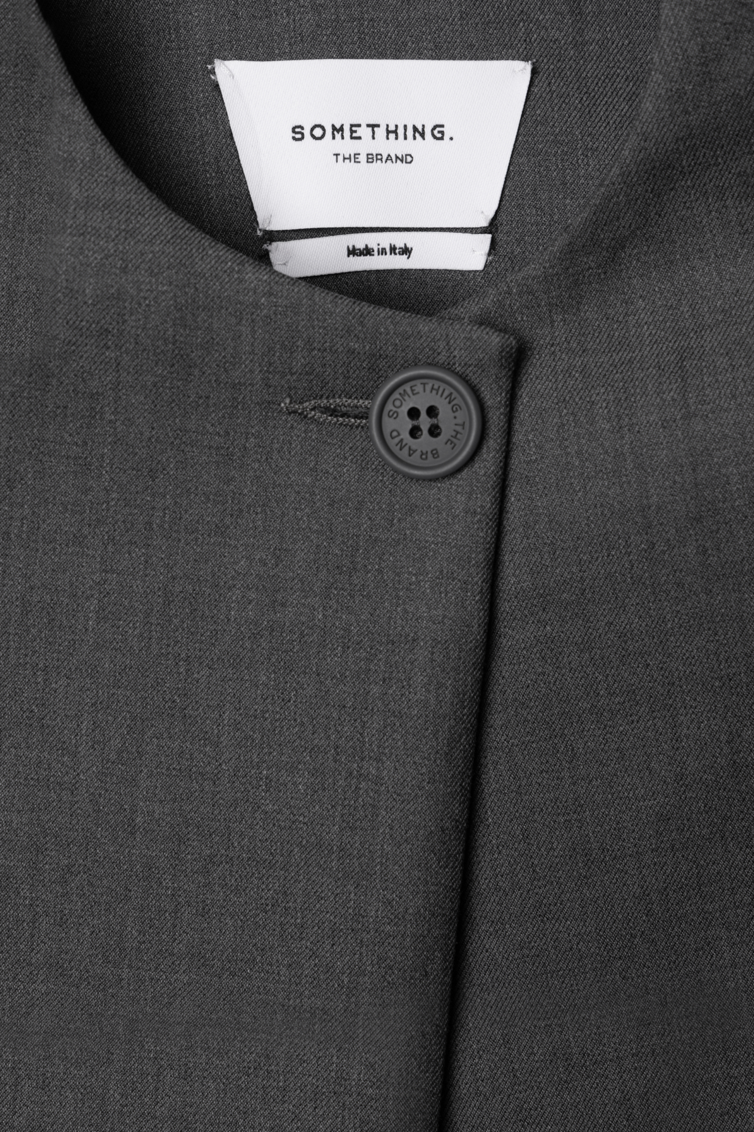 Zaraph Cape in Virgin Wool.